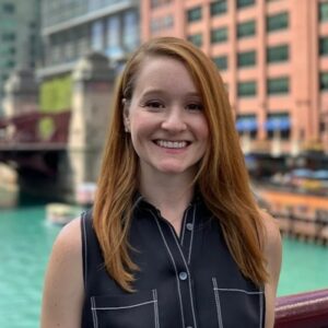 Headshot of Meghan by the Chicago River